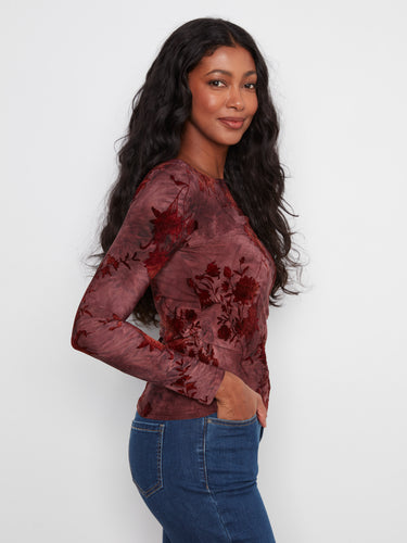 Sophisticated slim fit design beautifully accentuates the figure, making it a versatile piece for day or night wear. By Charlie B.