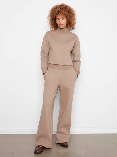 The pants come with an elastic waistband, ensuring a snug and flexible fit throughout the day. Made by Charlie B.