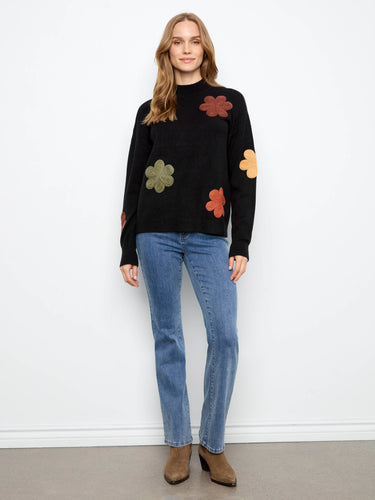 Drop shoulder design complements the relaxed silhouette of this charming embroidered piece. By Charlie B.