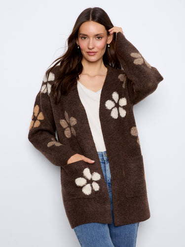 Cardigan showcasing bouclé floral details, adding a touch of elegance to any outfit. Designed for comfort and style by Charlie B.