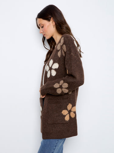 Enjoy the practicality of patch pockets on this stylish cardigan, offering both function and flair. Crafted with care by Charlie B.
