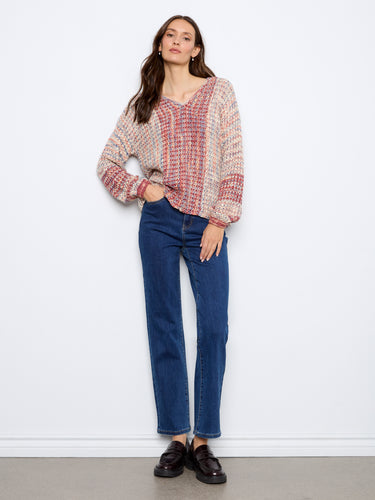 The V-neckline adds an elegant touch to this versatile piece, suitable for both casual and semi-formal occasions by Charlie B.
