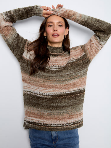 Striped sweater featuring a cozy mock neckline, perfect for chilly days. Crafted with care and style by Charlie B.