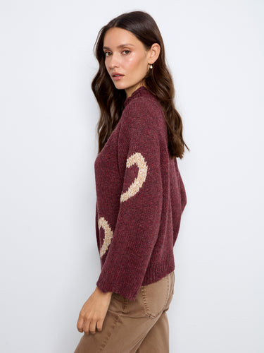 Featuring 3/4 bell sleeves, this sweater offers an elegant silhouette while maintaining comfort. Its unique design stands out by Charlie B.