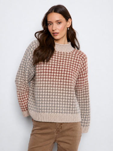 Cozy sweater featuring a stylish mock neck design, perfect for a casual yet chic look. Ideal for layering. By Charlie B.
