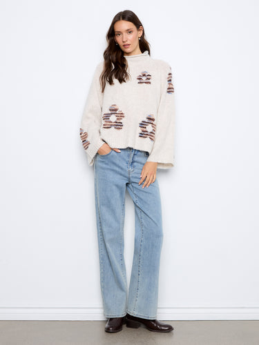 Enjoy the relaxed fit of this sweater, perfect for casual outings or lounging in comfort. By Charlie B.
