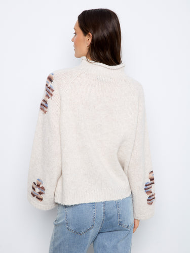 Experience ultimate comfort with the relaxed fit of this versatile and trendy sweater. By Charlie B.