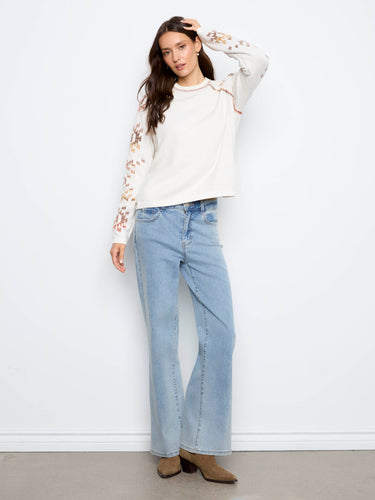 The raglan sleeves add a casual touch to this relaxed fit sweater, perfect for laid-back style by Charlie B.
