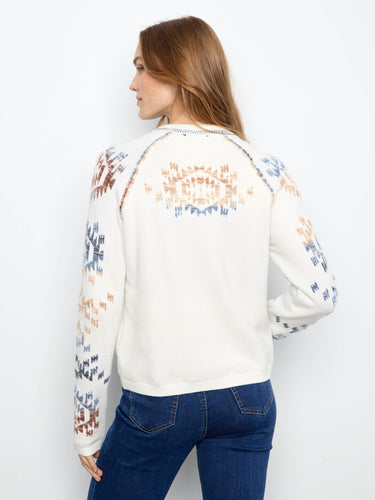 Raglan sleeves enhance the fit of this stylish sweater, offering both comfort and flexibility. By Charlie B.