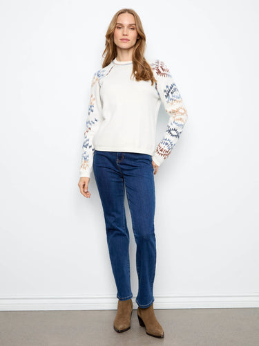 The crew neckline adds a classic touch to this comfortable and chic sweater design. Perfect for layering. By Charlie B.