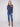Floral embroidered sleeves on a heather denim sweater offer a unique fashion statement by Charlie B.