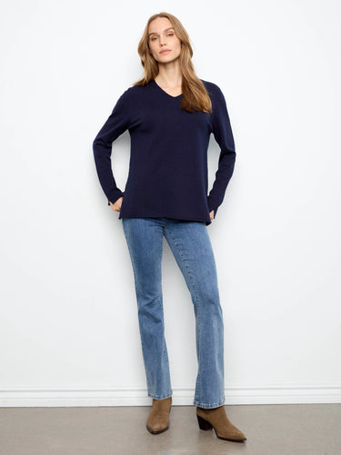 This stylish piece boasts long sleeves, offering both comfort and sophistication. A timeless design by Charlie B.