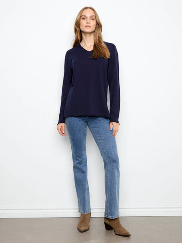 Crafted from soft knit fabric, this piece ensures comfort while maintaining a fashionable look. Exclusively by Charlie B.