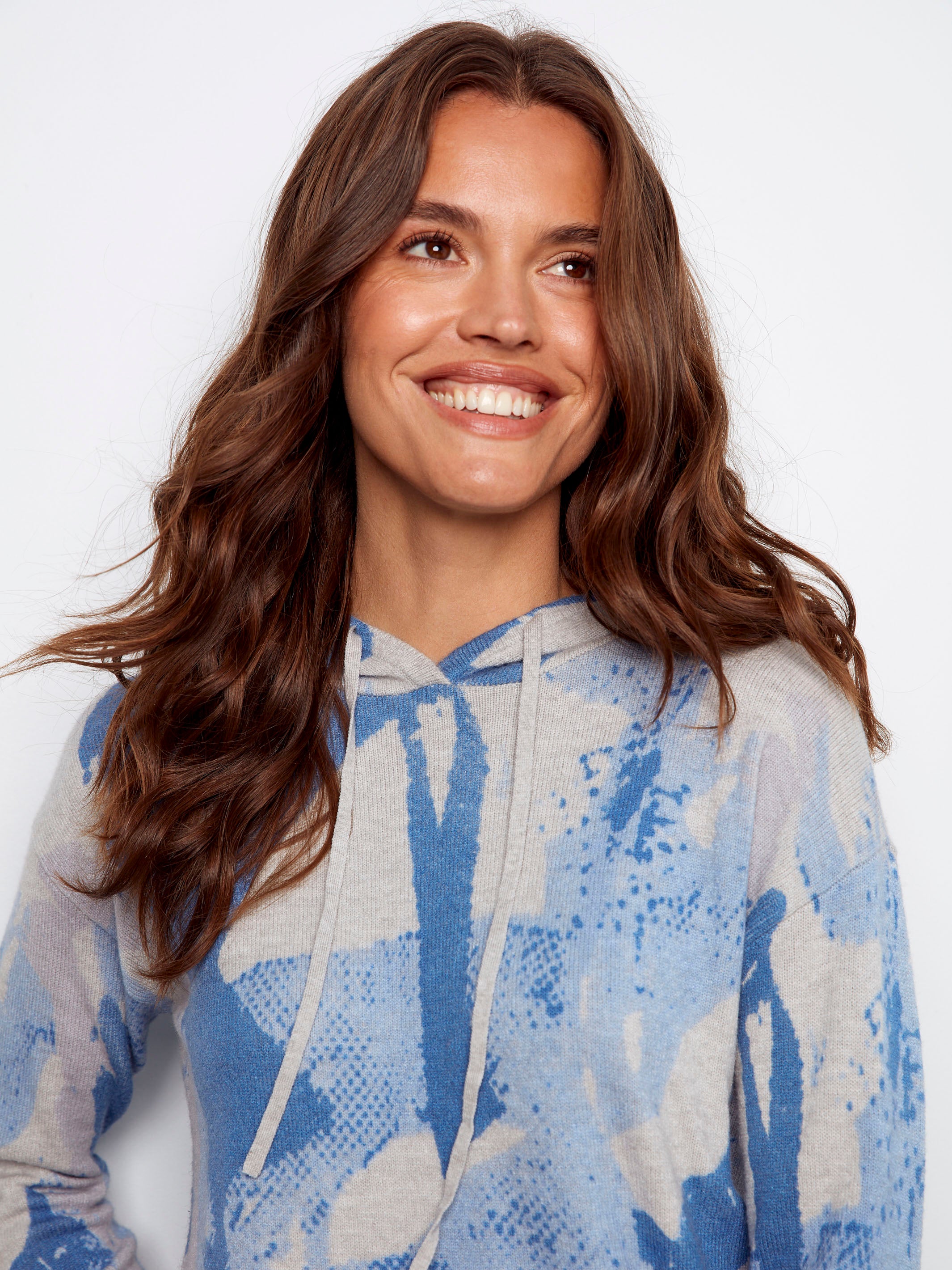 Abstract printed sweater featuring drop shoulders for a relaxed fit, ideal for everyday wear by Charlie B.