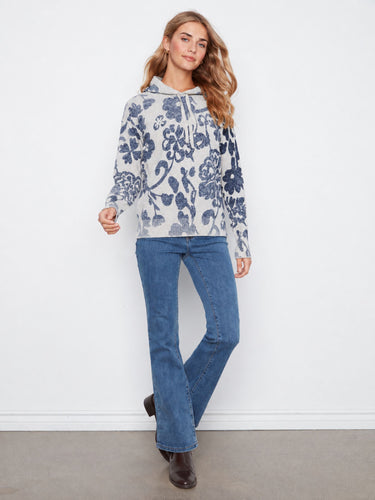 Floral printed cotton hoodie with a washed effect, featuring a drawstring hood for adjustable fit by Charlie B.