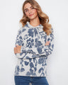 Gray cotton hoodie adorned with a floral print and long sleeves, combining elegance and casual wear by Charlie B.