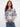 Abstract Rococo print on this crew neck sweater offers a modern twist on classic style by Charlie B.