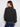 Heather charcoal sweater showcasing beautiful floral embroidery and a relaxed drop shoulder style by Charlie B.