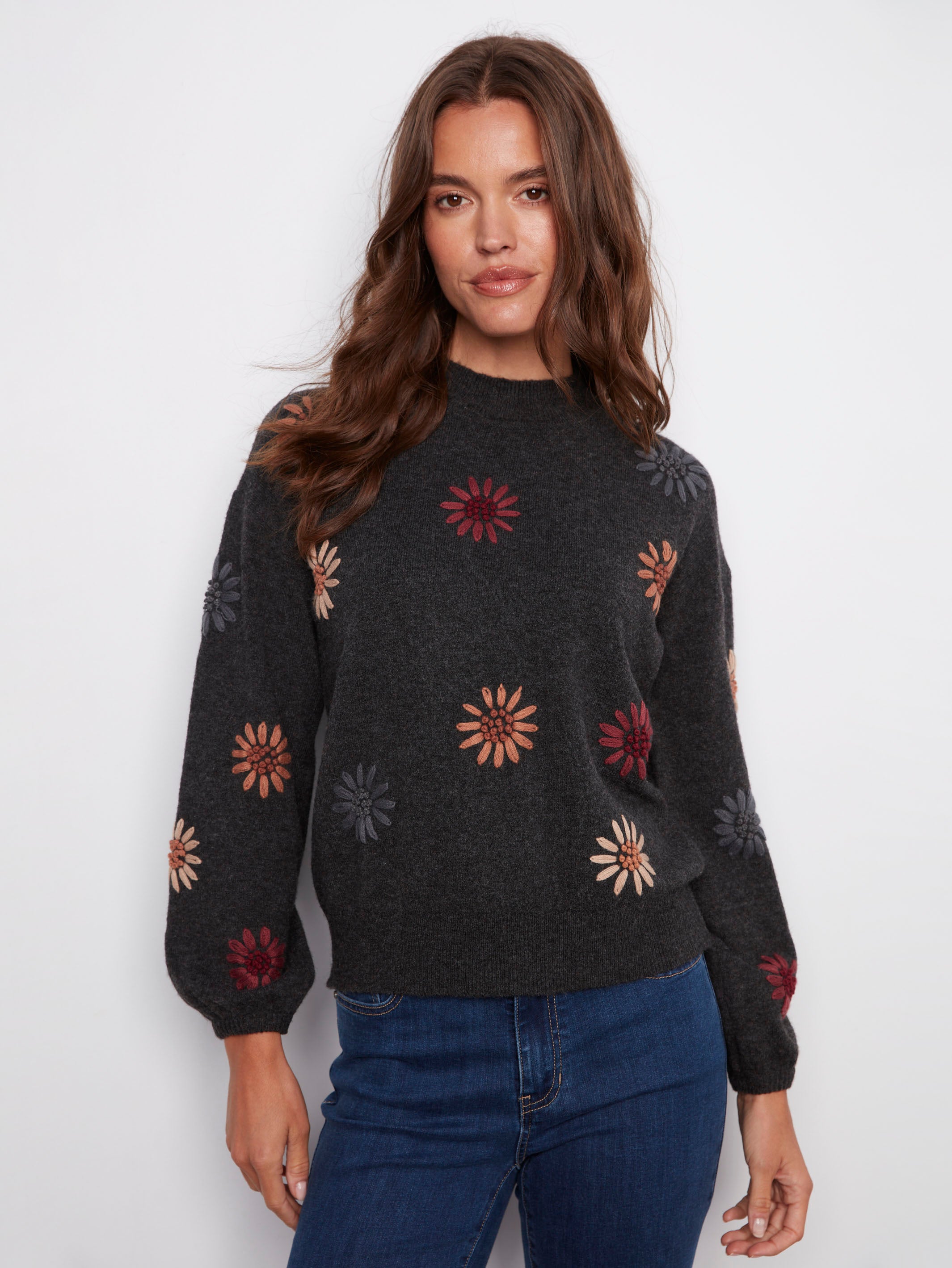 Charcoal sweater adorned with floral embroidery, featuring a stylish drop shoulder design by Charlie B.