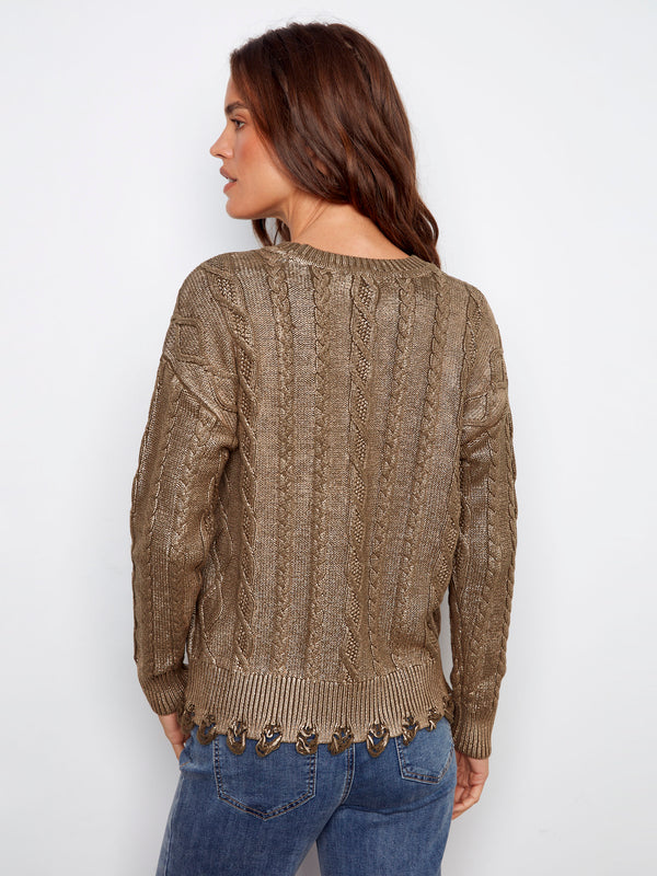 Versatile crew neckline adds sophistication to this metallic cable knit piece in spruce by Charlie B.