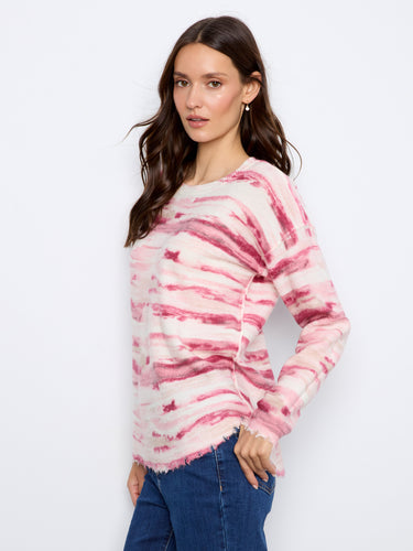 Reversible design enhances the versatility of this stylish pink and white sweater by Charlie B.