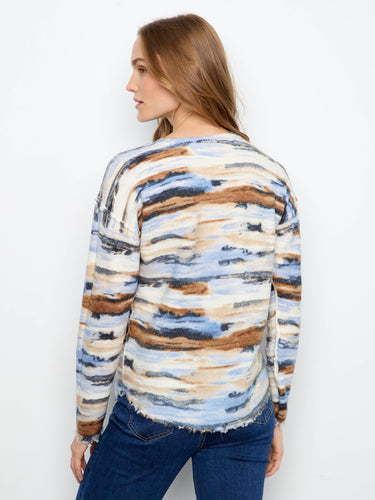With its unique pattern and crew neck, this plush knit sweater is both fashionable and functional. Ideal for layering. By Charlie B.