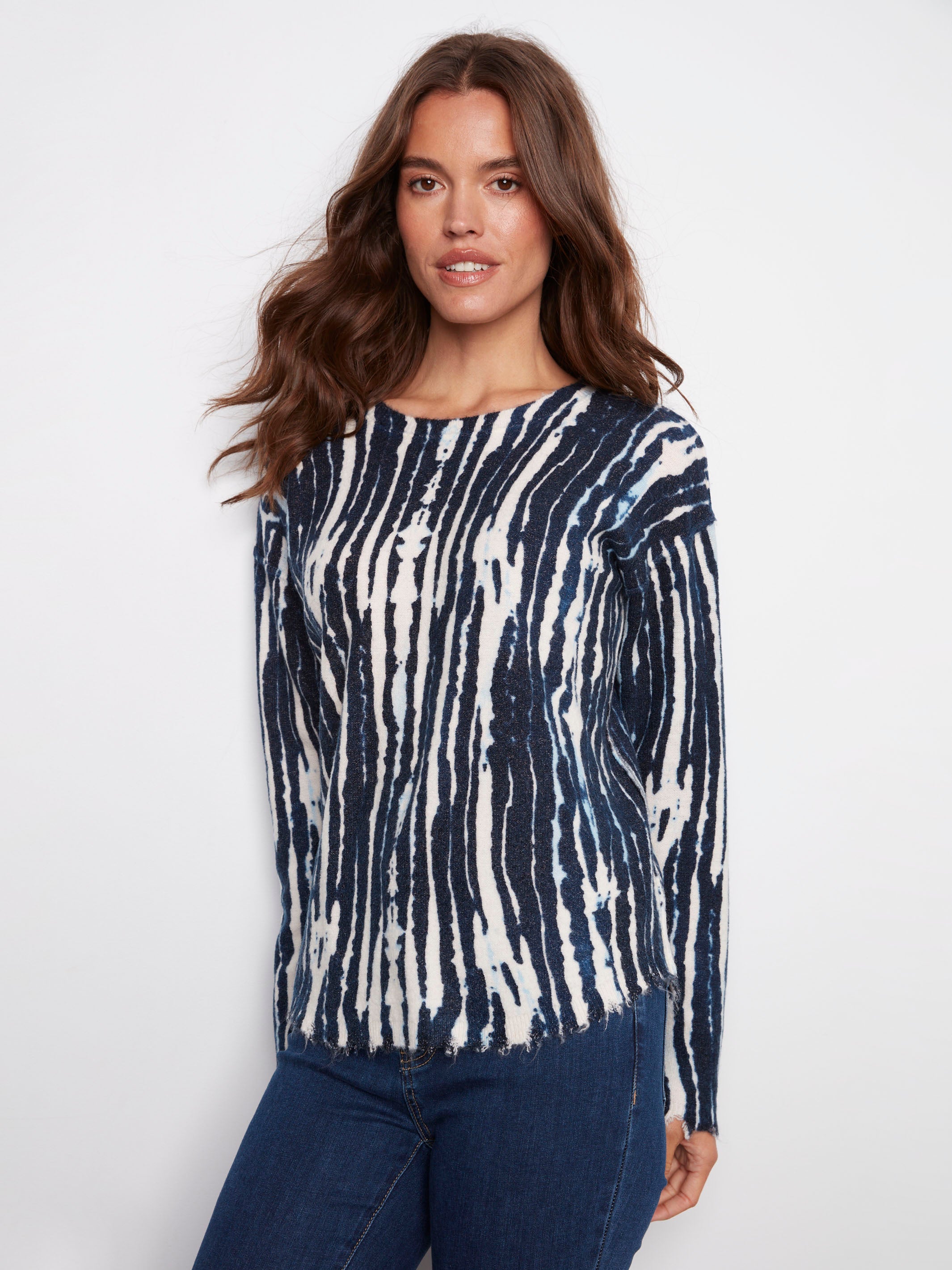 Chic blue and white sweater featuring a reversible design, offering versatile styling options by Charlie B.
