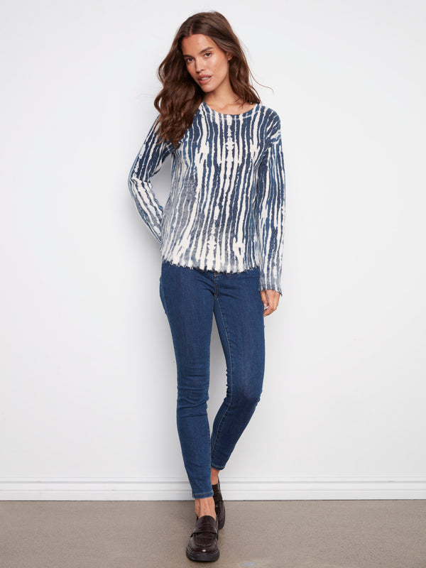 Elegant blue and white sweater with a classic crew neckline, ideal for layering by Charlie B.