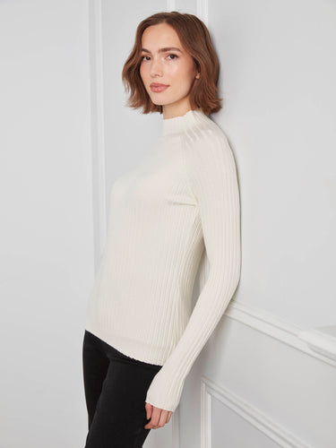 Mock neck detail offers an elegant touch to any ensemble while ensuring comfort throughout the day. Discover luxury wear by Charlie B.