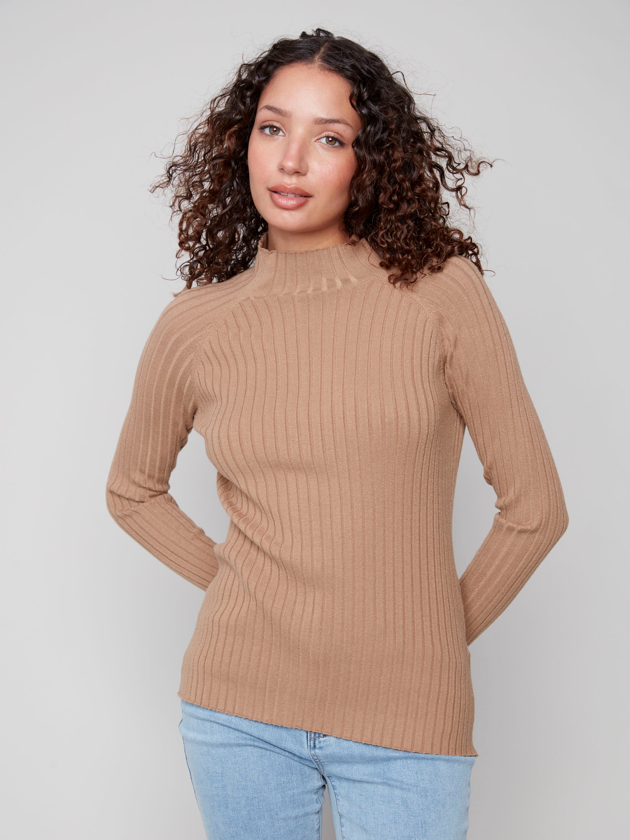 Truffle sweater featuring a mock neck design for a chic look, perfect for layering in cooler weather by Charlie B.