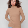Truffle sweater featuring a mock neck design for a chic look, perfect for layering in cooler weather by Charlie B.