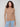 Elegant truffle sweater crafted from ribbed knit fabric, complete with long sleeves for added warmth by Charlie B.
