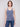 Chic V-neck design with intricate chevron patterns by Charlie B.