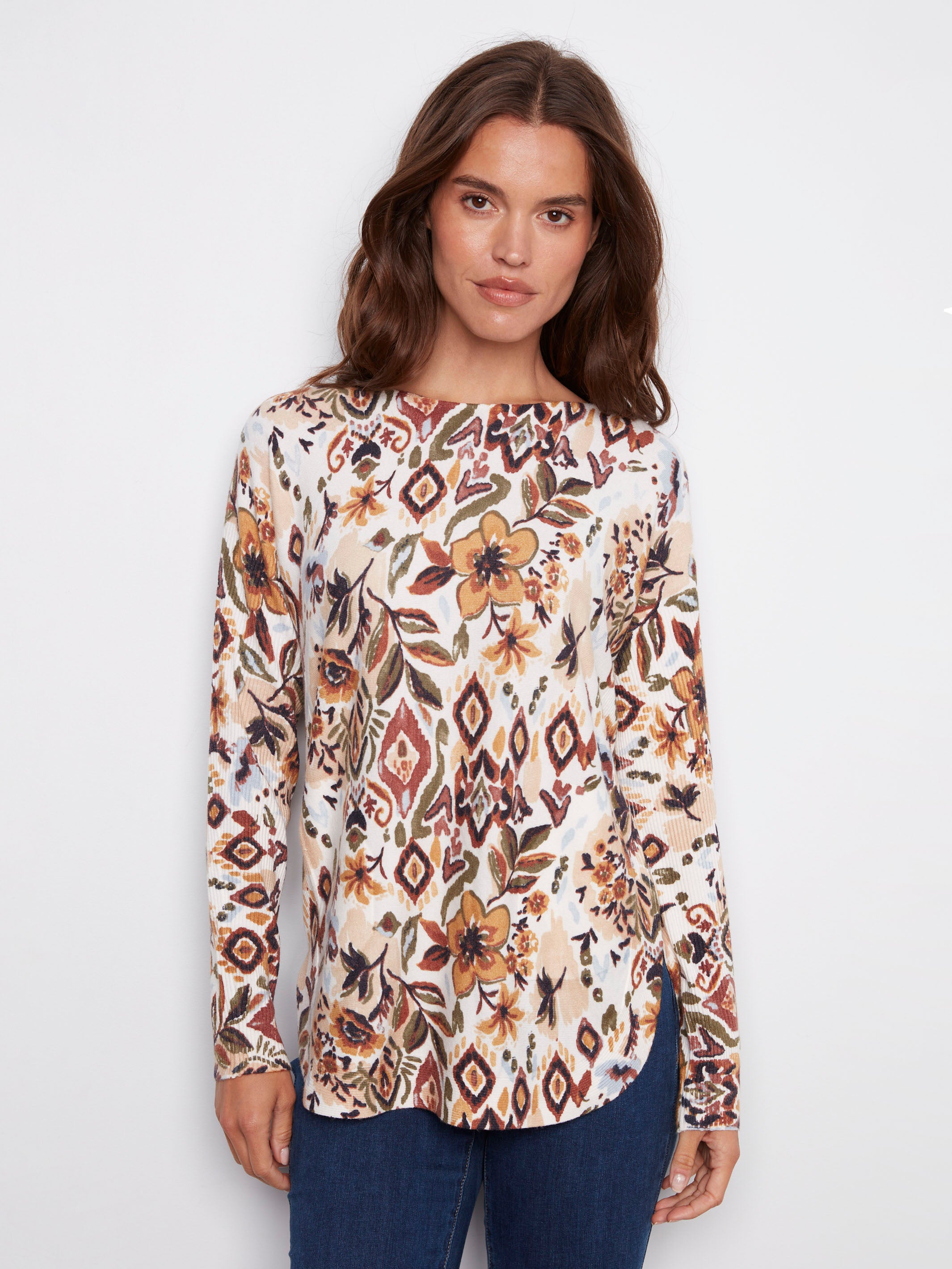 Jacobean sweater featuring a stylish boat neck and vibrant abstract floral design, perfect for any occasion by Charlie B.
