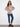 Elegant sweater with ribbed sleeves and a striking abstract floral pattern, adding a touch of sophistication by Charlie B.