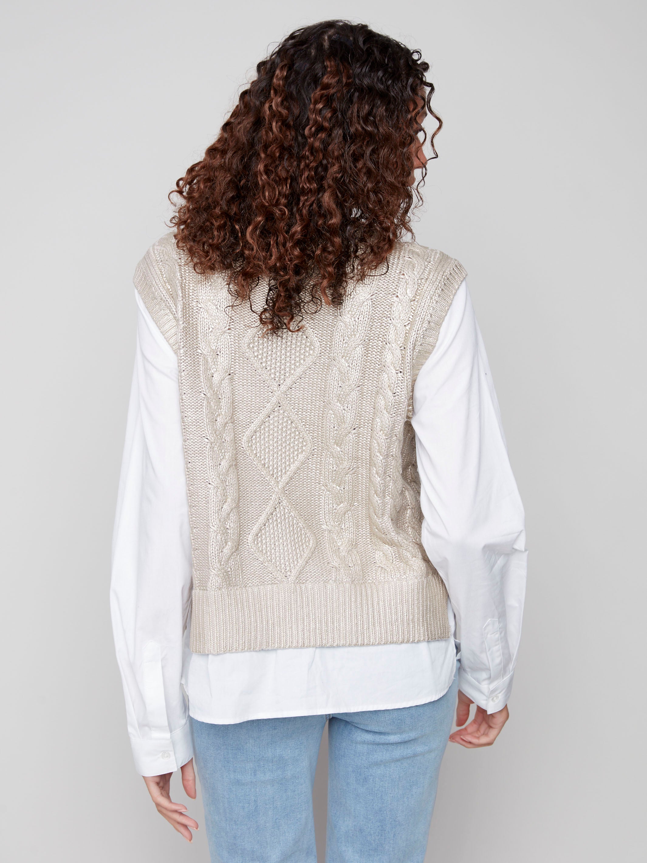 Chic gold foiled sweater vest with a classic crew neck and detailed cable knit pattern for an elegant appearance by Charlie B.