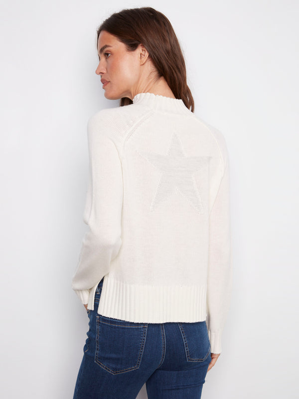 Raglan sleeves add comfort to this stylish ecru sweater with ribbed hems and the iconic 'SKI' graphic design by Charlie B.