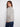 Heather grey sweater with PEACE jacquard pattern, designed with a mock neck and stylish raglan sleeves by Charlie B.