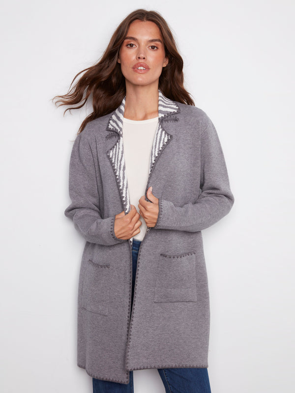 Heather grey cardigan featuring open front design and cozy contrast interior by Charlie B.