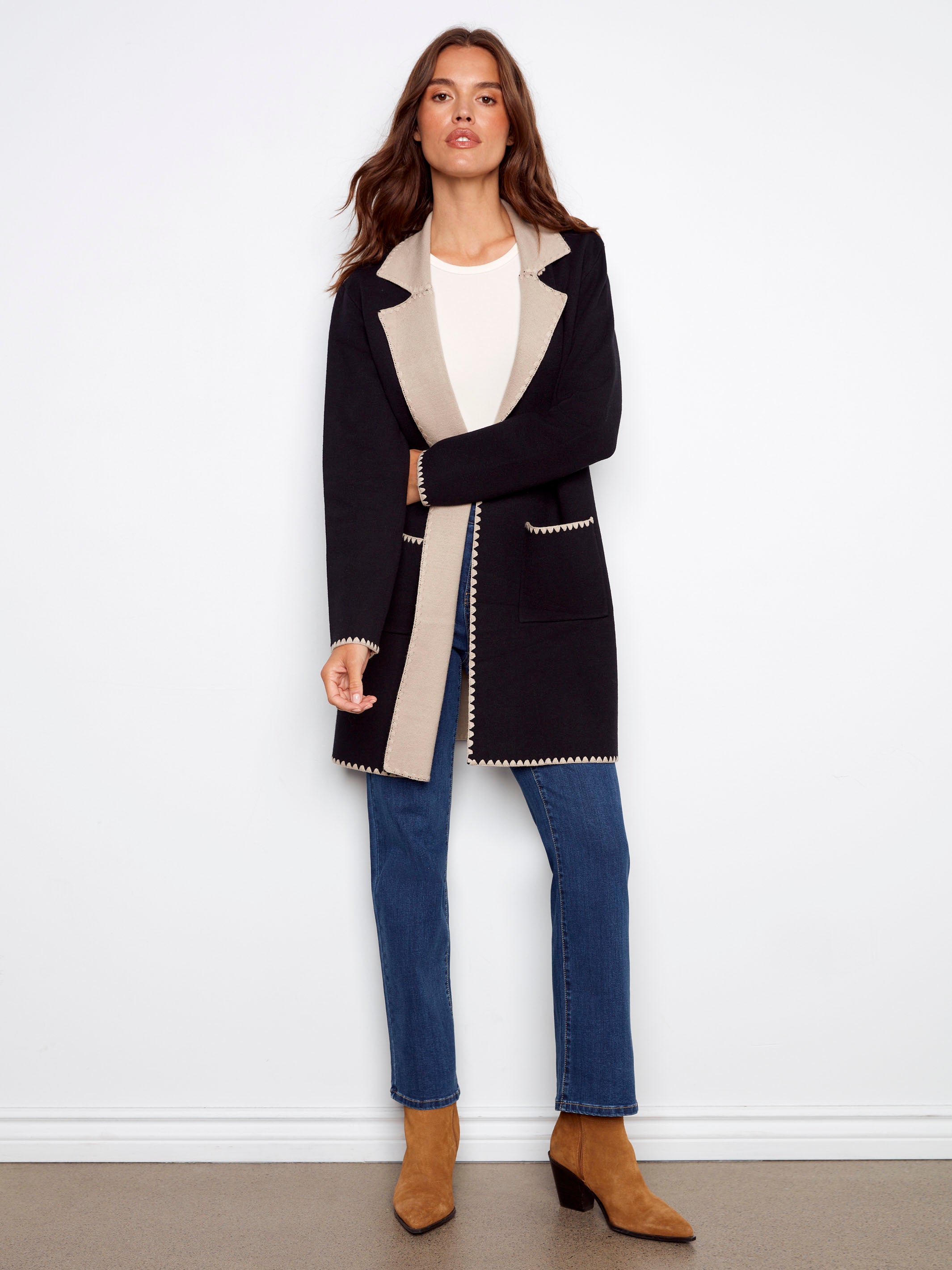 Elegant black cardigan with blanket stitch detail, perfect for a chic look by Charlie B.