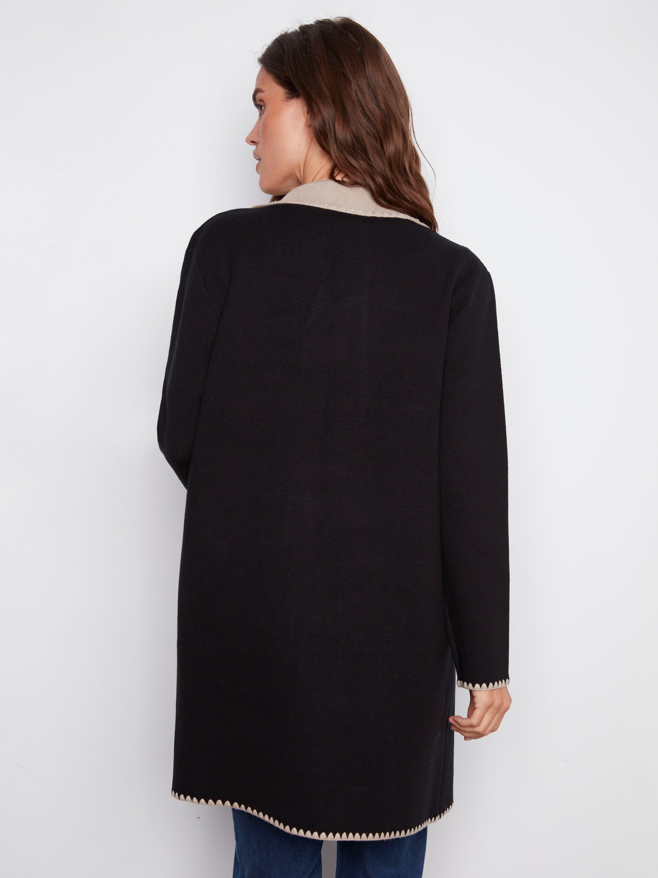 Sophisticated black cardigan with patch pockets for added functionality by Charlie B.