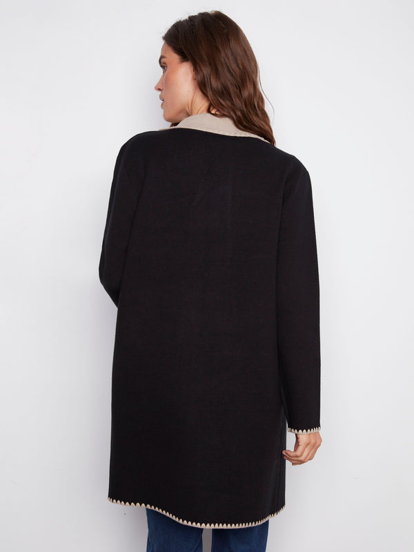 Sophisticated black cardigan with patch pockets for added functionality by Charlie B.