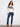 Stylish white sweater with raglan sleeves and bold 'PARIS' boucle embroidery for a chic look by Charlie B.