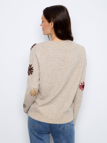 This cozy sweater boasts ribbed cuffs and hem for added texture and warmth during chilly weather. By Charlie B.