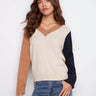 Sweater featuring a stylish V-neck and ribbed texture by Charlie B.