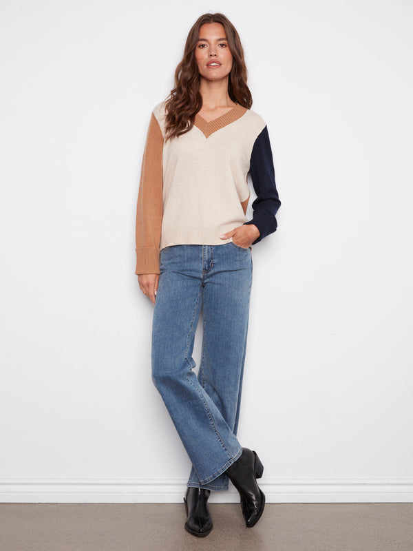 Fashionable wide cuffs add flair to this cozy sweater by Charlie B.