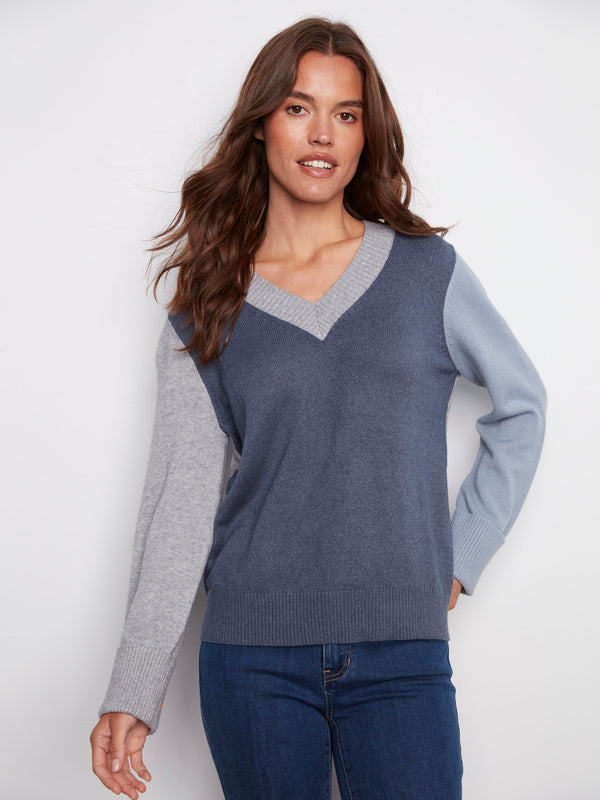 Elegant V-neck sweater featuring a stylish colorblock pattern in moonlight hues by Charlie B.