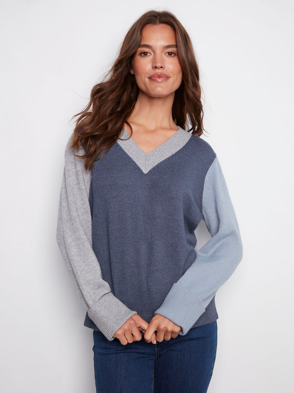 Versatile V-neck sweater with distinctive colorblock design and cozy wide cuffs by Charlie B.