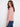 Soft heather primrose sweater featuring eye-catching star stud details along the sleeves and a cozy crew neck by Charlie B.