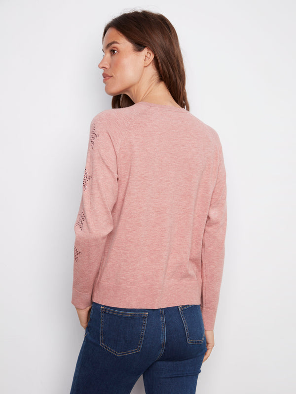 Stylish and comfortable, this sweater boasts raglan sleeves and subtle star studs that elevate its look by Charlie B.